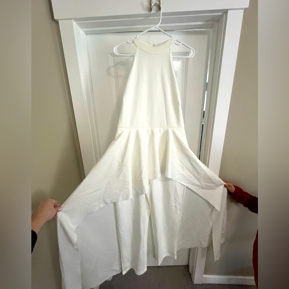 NWT-SHEIN White Sleeveless Jumpsuit. Bell bottom Flowing fabric. Never worn